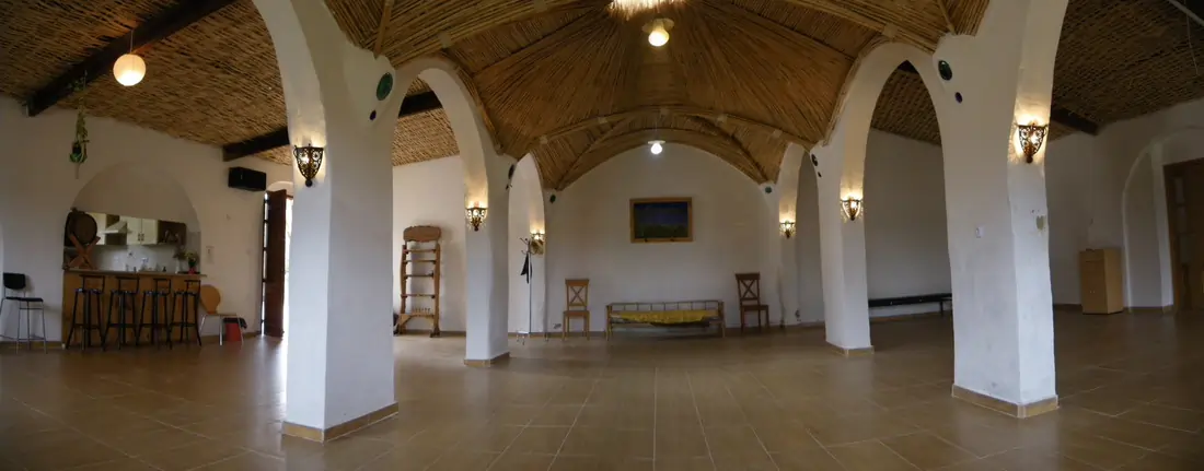 Biovives dining area with stone arches